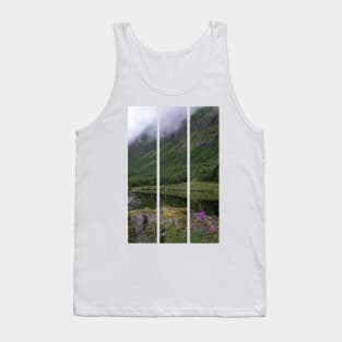 Wonderful landscapes in Norway. Senja, Nordland. Beautiful scenery of a valley with lupine flowers on the rocks. Mirror in the lake. Cloudy summer day. Fog and mountains in background (vertical) Tank Top